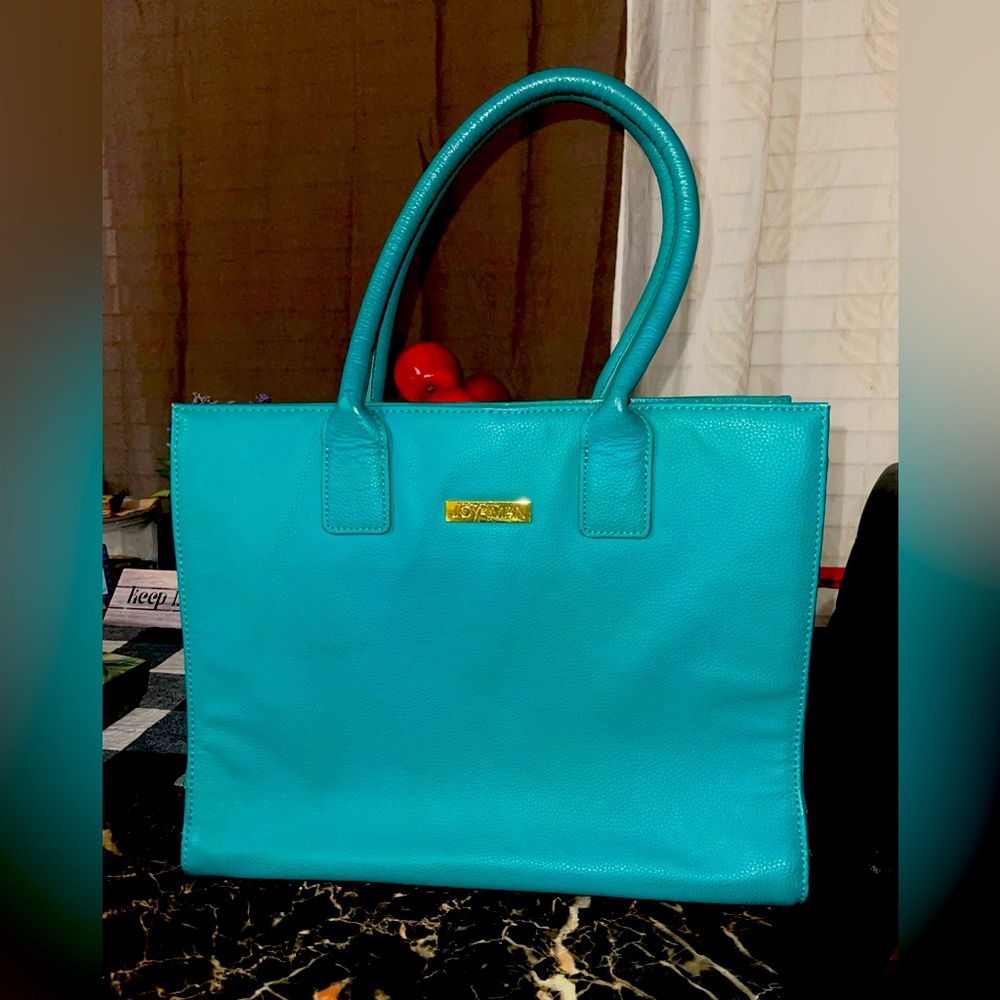 Joy and imán purse